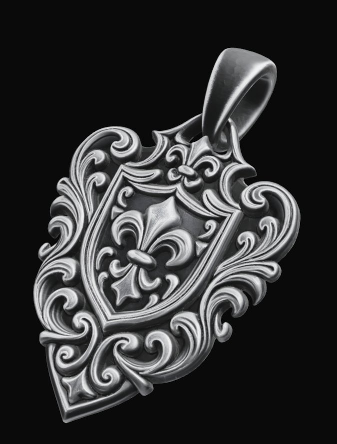 Sample design: sterling silver pendant with a fleur-de-lis shield framed by baroque scrolls